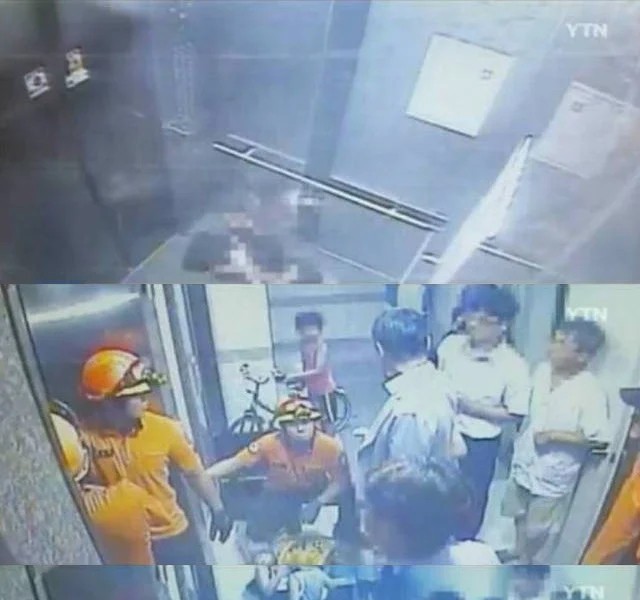 エレベーターに女性が閉じ込められたが、管理所長が救助を阻んで失神した