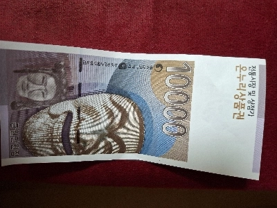 伝統市場に行って5万ウォン買ったら商品券をくれました。